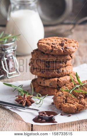 Homemade Chocolate Chip Cookies on paper over wooden background Ready to Eat