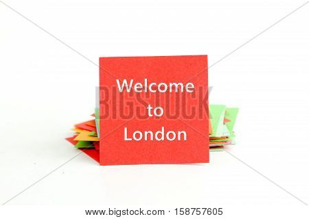 picture of a red note paper with text welcome to london
