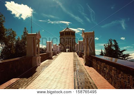 Famous orthodox monastery of Kykkos, Holy monastery of the Virgin of Kykkos in Cyprus. Way to the church near king Macarius grave. Travel sightseeing image
