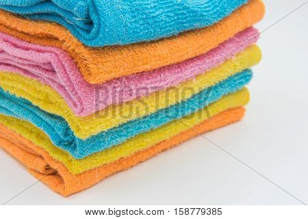 Closeup Colorful Beautiful towels on White background .