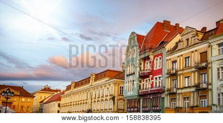 Colorful houses in Timisoara at sunset Romania