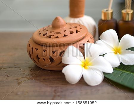 Spa massage compress balls herbal ball on the wooden with treaments spa Thailand select focus