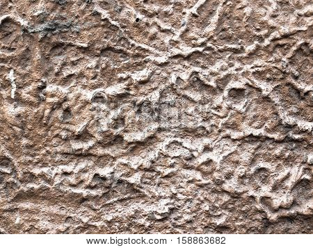 Old Wall Covered With Rough Stained Weathered Brown Stucco Finishing