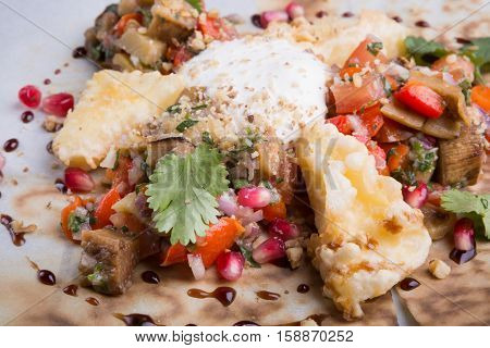 Midle east salad with mushrooms and pomegranate