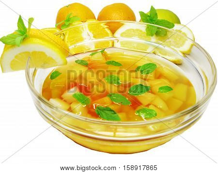 fruit cruchon cocktail punch in bowl with ice and fruit