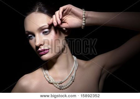 Beautiful woman with pearl jewelry