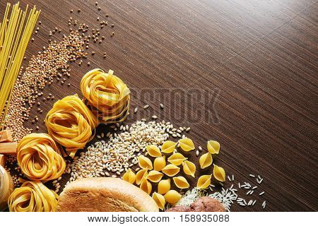 Set of products with complex carbohydrates on wooden background