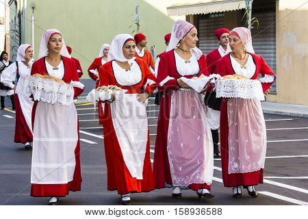 SELARGIUS, ITALY - September 11, 2016: Former marriage Selargino - Sardinia - group of beautiful women parading in traditional Sardinian costume