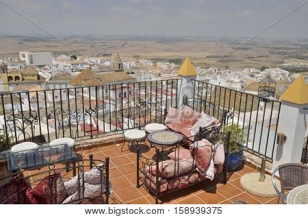 MEDINA SIDONIA, SPAIN - JULY 28, 2014: Terrace of restaurant with views to the village of Medina Sidonia a white town of the province of Cadiz Andalusia Spain