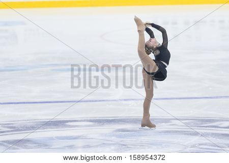Minsk Belarus -November 19 2016: Unidentified Female Figure Skater performs Ladies Free Skating Program at Ice Star International Figure Skating competition in November 19 2016 in Minsk Republic of Belarus