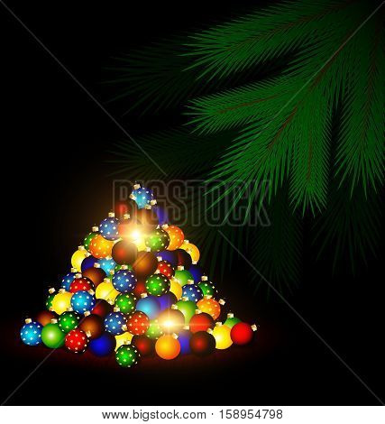 dark abstract room multicolored Christmas balls on the floor and the green branch of the large tree