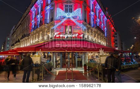 Paris France-November 26 2016 : The Christmas decoration on Fouquet's restaurant located at Champs Elysees avenue in Paris.Fouquet's is a historic restaurant was founded in 1889.