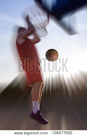 Young Man Jumping And Making A Fantastic Slam Dunk Playing Stree