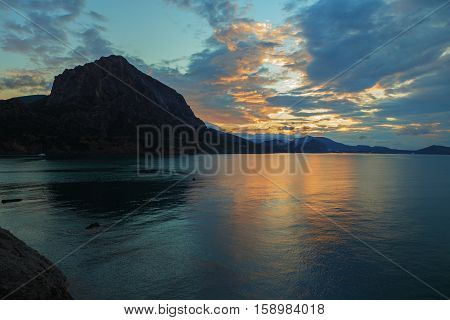 Beautiful sunrise in the Blue Bay near the village Novyi Svit. Crimea.