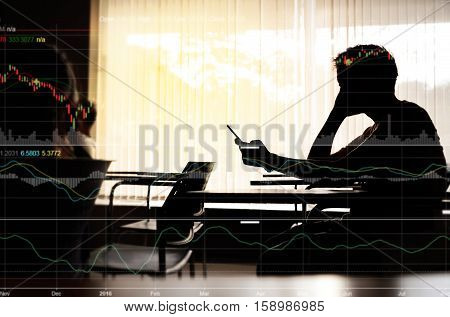 Silhouette of business man making trading online on the smart phone in meeting room or office. New ways to make economy and trading. Phone with blur trading screen copy space.