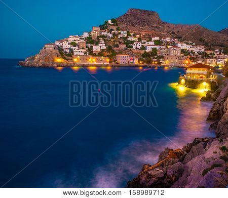 Hydra island on a summer night in Greece. Beautiful landscape with night illumination.