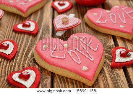 Festive cookies decorated with pink sugar mastic