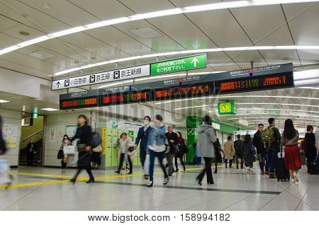Tokyo Japan - November 21 2016 : Passengers at Shinjuku station in Tokyo Japan .