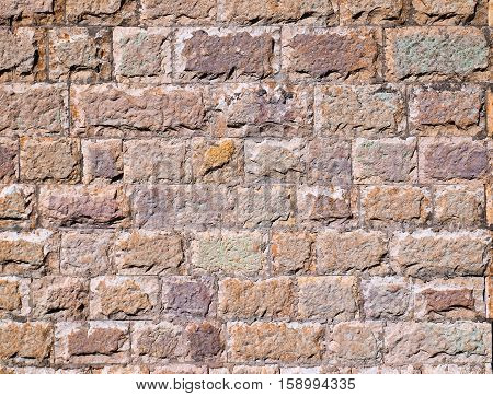 Stones block wall, colorfull old background texrure