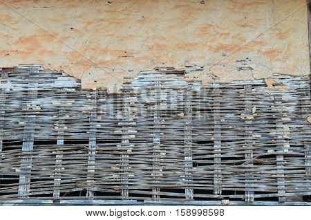 Old Wooven Bamboo Wall Plaster With Clay Texture