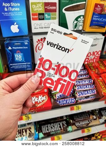 Plattsburgh, Usa - September 10, 2018: A Man Holding A Verizon Gift Card. Verizon Is An American Tel