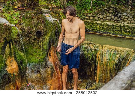 Man Tourist In Belulang Hot Springs In Bali, Village Mengesta, Penebel District, Tabanan Regency