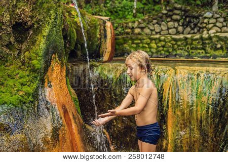 Boy Tourist In Belulang Hot Springs In Bali, Village Mengesta, Penebel District, Tabanan Regency Tra
