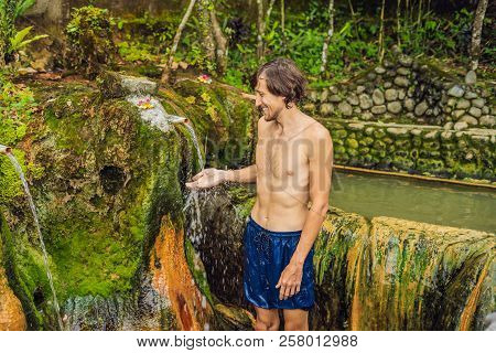Man Tourist In Belulang Hot Springs In Bali, Village Mengesta, Penebel District, Tabanan Regency