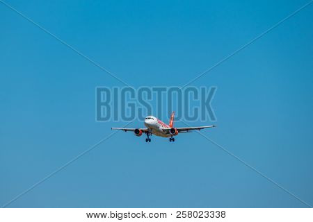 Zurich, Switzerland - July 19, 2018: Easyjet lowcost airlines airplane preparing for landing at day time in international airport