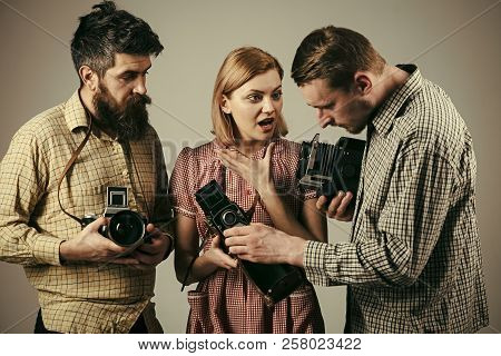 Men In Checkered Clothes, Retro Style. Vintage Photography Concept. Company Of Busy Photographers Wi