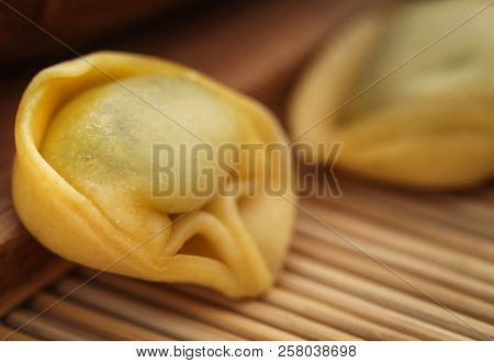 Italian Tortelloni Made Of Flour With Spinach And Other Ingredients