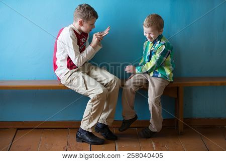 Belarus, Gomel, On July 2, 2018. Zyabrovskaya Church.two Russian School-age Boys Are Talking.the Eld