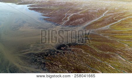 Natural Shapes And Patterns In Bonne Anse Bay At Low Tide, France