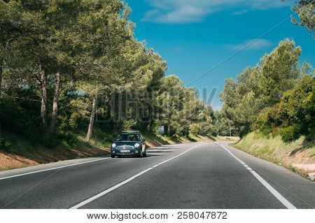 Camallera, Girona, Spain - May 18, 2018: Blue Colour Mini Hatch Second Generation R56 Driving In Mot