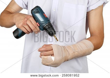Close Up Of Young Asian Boy With Arm Plaster Fiberglass Cast Covering The Wrist Finger And Arm. Stud