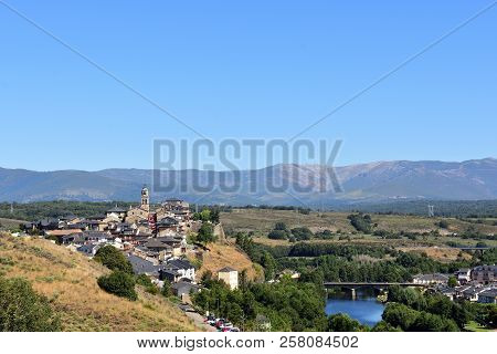 Elevated View Of The Medieval Town Of Puebla De Sanabria And The River Tera, Zamora Province, Castil