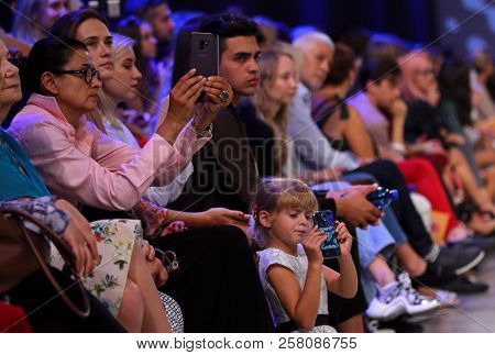 Kyiv, Ukraine - September 3, 2018: People Watch The Fashion Show By Designer Katerina Kvit As Part O