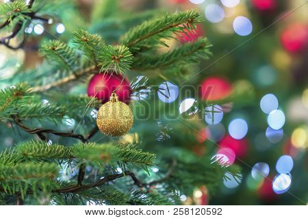 Bright Christmas Spurse Tree With Decorations, Christmas Balls, Colorful Garlands, Bokeh. Colorful F