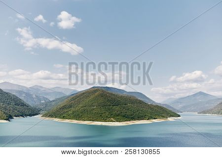 Landscape Of Zhinvali Reservoir Lake Landscape With Mountains . The Main Caucasus Ridge. Georgia.