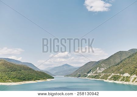 Landscape Of Zhinvali Reservoir Lake Landscape With Mountains . The Main Caucasus Ridge. Georgia.