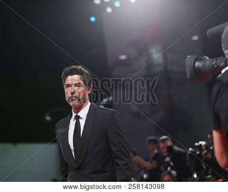Alessandro Gasmann walks the red carpet ahead of the 'Una Storia Senza Nome' screening during the 75th Venice Film Festival at Sala Grande on September 7, 2018 in Venice, Italy.