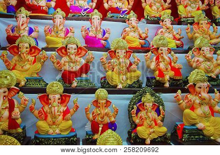 Plaster Of Paris And Clay Idols Of Lord Ganesha For Sell At Pune, Maharashtra, India