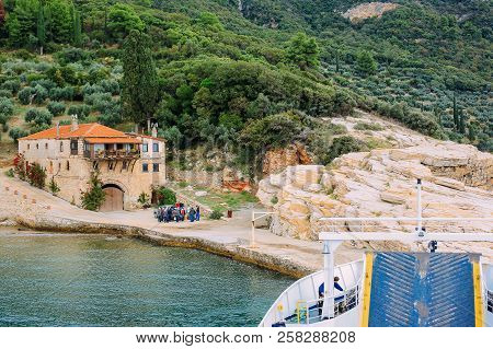 Holy Mountain, Greece - September 23, 2014: Pilgrims Take A Ferry To The Holy Mountain Athos