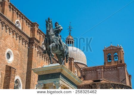 Venice, Italy - 17.08.2018: Bronze Equestrian Statue Bartolomeo Colleoni In Front Of The Renaissance