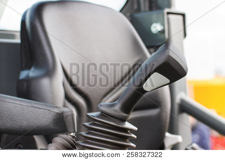 Operating Control Panel And Vehicle Seat In Background, Detail And Part Of Industrial Agricultural M