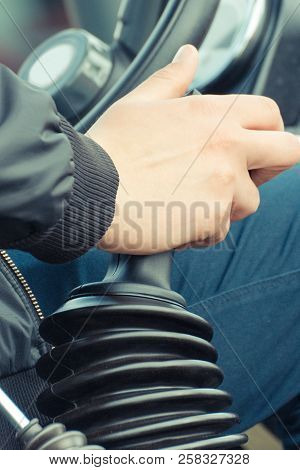 Man Operating Control Panel And Steering Wheel In Agricultural Or Industrial Machine, Part And Detai