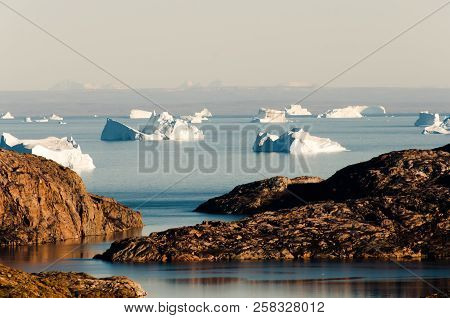 Icebergs In The Arctic Sea - Greenland