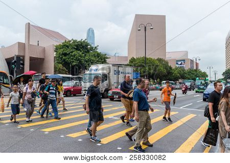 Tsim Sha Tsui, Hong Kong 17 August 2018:- People crossing the street