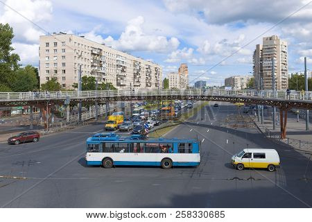 Saint Petersburg, Russia - August 13, 2018: The Trolleybus Crosses Avenue Of Glory