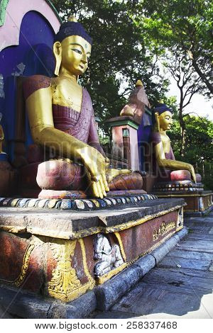 The Buddha Statues In The Swayambhunath Temple. Kathmandu, Nepal